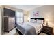 Comfortable bedroom with large dresser and neutral color palette at 3099 Regency Park Dr, Lithonia, GA 30038