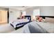 Bright bedroom featuring carpeted floors, two beds, and neutral colored walls at 3099 Regency Park Dr, Lithonia, GA 30038