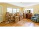 Bedroom with a hardwood floor, boxes, and a view of the backyard at 544 W Macedonia Church Rd, Oxford, GA 30054