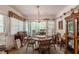 Dining area with a round table, neutral tones, and sliding glass doors to the outside at 544 W Macedonia Church Rd, Oxford, GA 30054