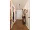 Hallway with brick flooring, white trim, and decorative lighting at 544 W Macedonia Church Rd, Oxford, GA 30054