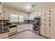 Traditional style kitchen with granite countertops, stainless steel appliances, and white cabinets at 544 W Macedonia Church Rd, Oxford, GA 30054