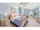 Serene bedroom featuring soft blue walls, a gold-framed bed, and charming decor at 1481 Highway 85 Connector, Brooks, GA 30205