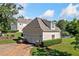 Detached two-car garage with ample parking space and potential for a workshop or storage area at 1481 Highway 85 Connector, Brooks, GA 30205