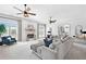 Cozy living room featuring a fireplace, comfortable seating, and natural light creating a warm and inviting atmosphere at 1481 Highway 85 Connector, Brooks, GA 30205