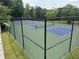 Community pickleball courts featuring well-maintained green and blue surfaces with black chainlink fence surround at 1481 Highway 85 Connector, Brooks, GA 30205