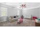Play room featuring a couch, crib, play table and toys at 1481 Highway 85 Connector, Brooks, GA 30205