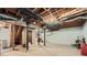 Unfinished basement with exposed beams, brick walls, and concrete floor offering a blank canvas for customization at 2336 Vistamont Dr, Decatur, GA 30033