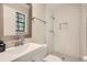Stylish bathroom with tiled shower, modern vanity, and contemporary fixtures at 2336 Vistamont Dr, Decatur, GA 30033