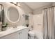 Bathroom includes shower-tub combination, a vanity with sink, and a toilet at 2336 Vistamont Dr, Decatur, GA 30033