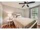 Comfortable bedroom features hardwood floors, natural light, and a neutral color palette at 2336 Vistamont Dr, Decatur, GA 30033