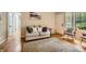 Living room featuring hardwood floors, a comfortable couch, and a view towards the home's entrance at 2336 Vistamont Dr, Decatur, GA 30033