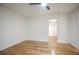 An open bedroom with hardwood flooring and neutral colors at 3480 Mount Olive Rd, Atlanta, GA 30344
