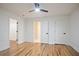 Bedroom featuring hardwood floors, two closets, and neutral paint at 3480 Mount Olive Rd, Atlanta, GA 30344