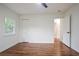 Bedroom boasts hardwood floors and a ceiling fan and closet at 3480 Mount Olive Rd, Atlanta, GA 30344