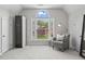 Bright bedroom with a large window and a cozy reading nook at 350 Medridge Dr, Johns Creek, GA 30022