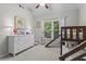A playful bedroom with a bunk bed, slide, and decorations at 350 Medridge Dr, Johns Creek, GA 30022