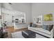 Bright living room with an open layout and access to both the kitchen and outdoor spaces at 350 Medridge Dr, Johns Creek, GA 30022