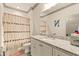 Bright bathroom with a shower and stylish white vanity at 525 E Main St, Buford, GA 30518