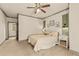 A serene bedroom with neutral colors and soft, inviting textures at 525 E Main St, Buford, GA 30518