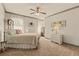 Charming bedroom boasts a cozy bed and decorative touches at 525 E Main St, Buford, GA 30518