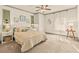 Bright bedroom with soft, neutral decor and plenty of natural light at 525 E Main St, Buford, GA 30518