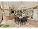 Inviting dining area with rustic charm, brick floors, and open layout at 525 E Main St, Buford, GA 30518
