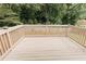 Spacious back deck offers a private spot to enjoy the home's wooded backyard at 6914 N Baggett Rd, Douglasville, GA 30134