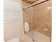 This bathroom features a sliding glass shower and mosaic tile accents at 6914 N Baggett Rd, Douglasville, GA 30134