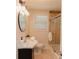 Bathroom featuring updated vanity, modern fixtures, and a shower at 6914 N Baggett Rd, Douglasville, GA 30134