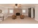 Neutral living room with a modern fireplace and decor at 6914 N Baggett Rd, Douglasville, GA 30134