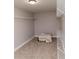 Empty walk-in closet featuring carpeted flooring and wire shelving at 6914 N Baggett Rd, Douglasville, GA 30134