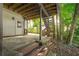 Covered patio area with access to the backyard, providing shade and a seamless transition to outdoor living at 1590 Greyson Rdg, Marietta, GA 30062