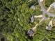 Aerial view of the house surrounded by lush greenery at 165 Colony Cir, Canton, GA 30114