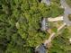 Overhead view of a house nestled among trees at 165 Colony Cir, Canton, GA 30114
