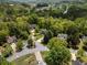 A group of houses in a wooded neighborhood at 165 Colony Cir, Canton, GA 30114
