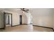 A light and airy bedroom boasts modern wood floors, a dark trim, and a ceiling fan at 165 Colony Cir, Canton, GA 30114