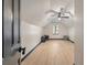 This bonus room features vaulted ceilings, a ceiling fan, and a large window at 165 Colony Cir, Canton, GA 30114