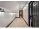 Bright hallway featuring industrial sconces and black trim at 165 Colony Cir, Canton, GA 30114