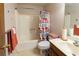 Functional bathroom with a shower, toilet, and vanity at 1830 Brandy Se Ln, Conyers, GA 30013