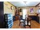 Traditional dining room with wood floors, decorative walls, and built-in china cabinet at 1830 Brandy Se Ln, Conyers, GA 30013