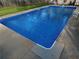 Inviting inground pool, perfect for relaxation and entertainment in the backyard at 1830 Brandy Se Ln, Conyers, GA 30013