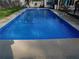 Inviting inground pool, perfect for relaxation and entertainment in the backyard at 1830 Brandy Se Ln, Conyers, GA 30013