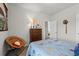 Cozy baseball themed bedroom with a comfortable chair and dresser at 295 Cranston Dr, Canton, GA 30114