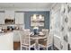 Cozy dining area adjacent to the kitchen, featuring a round table and stylish decor at 295 Cranston Dr, Canton, GA 30114