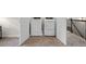 Conveniently located laundry area with modern washer, dryer, and easy access to stairs at 295 Cranston Dr, Canton, GA 30114