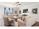 Spacious living room featuring comfortable seating, stylish decor, and plenty of natural light at 295 Cranston Dr, Canton, GA 30114