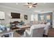 Comfortable living room with hardwood floors, stylish decor, and ample natural light at 295 Cranston Dr, Canton, GA 30114