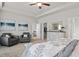 Spacious main bedroom with tray ceiling, sitting area, and ensuite bathroom access at 295 Cranston Dr, Canton, GA 30114