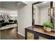 Inviting foyer with hardwood floors, modern decor, and a view into the living room at 311 Peachtree Hills Ne Ave # 10C, Atlanta, GA 30305